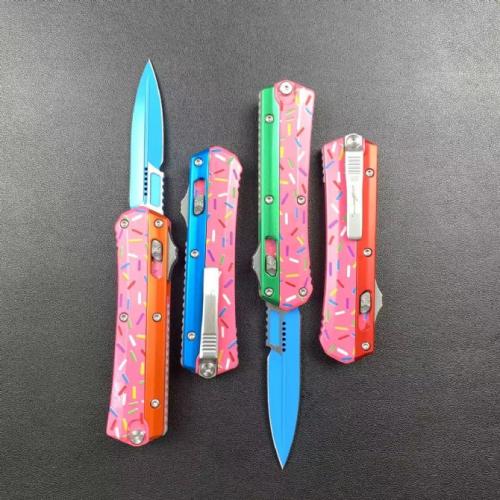 Introducing the Microtech Serpent Donut Large, featuring a sleek zinc-aluminum handle.