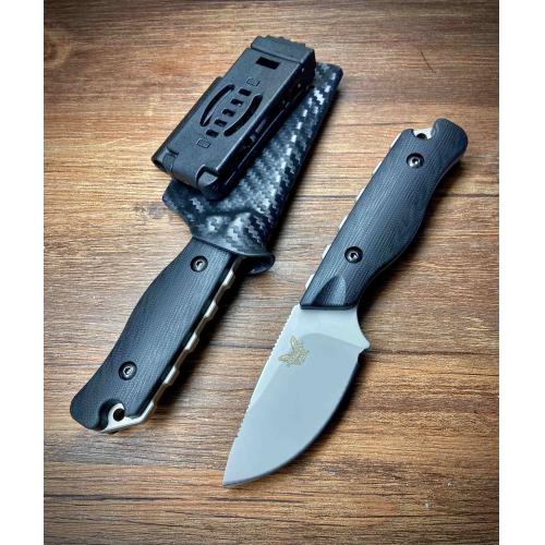 Benchmade 05017 Bushcrafter Knife: Precision-crafted for the wilderness enthusiast, this knife combi...