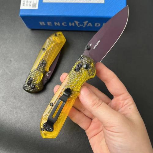 Introducing the new Benchmade Mini Freek 565PL-2501 Folding Knife, featuring a textured transparent PEI handle.