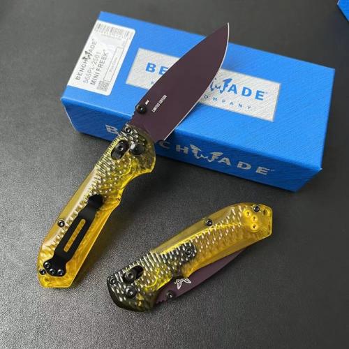 Introducing the new Benchmade Mini Freek 565PL-2501 Folding Knife, featuring a textured transparent PEI handle.